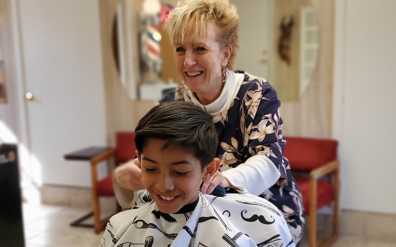 Young customer after a haircut